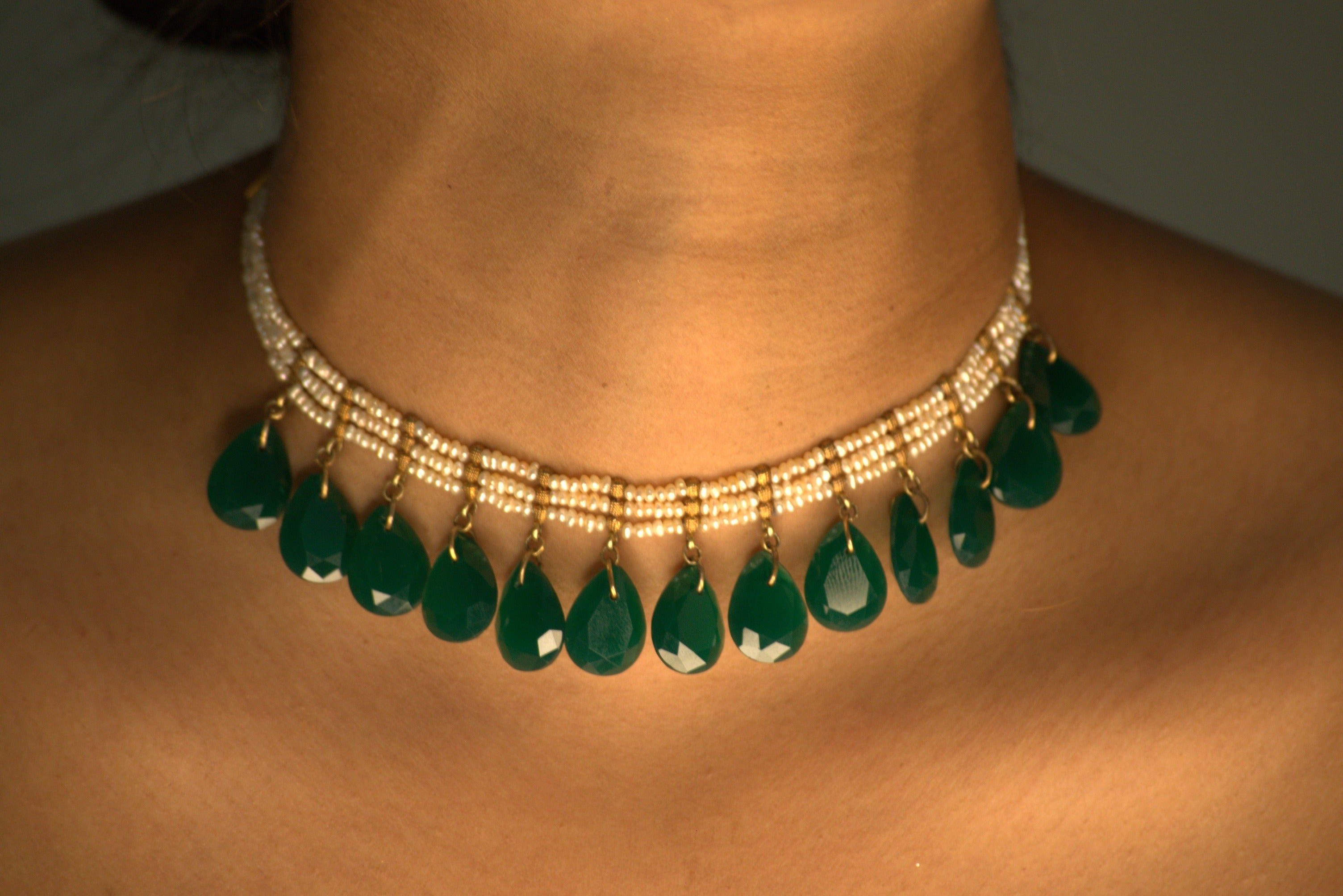 Zivar, a pure silver Necklace with green teardrop stones and pearls by Gulaal Jewels